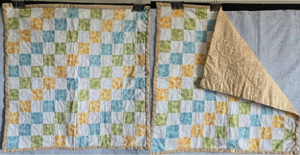 Quilt: Baby Blanket
Price: $100.00
Quilt Pattern: 2" x 2" Blocks
Quilt Size: 24" x 24"
Quilt Stitching: Butterfly Pentograph